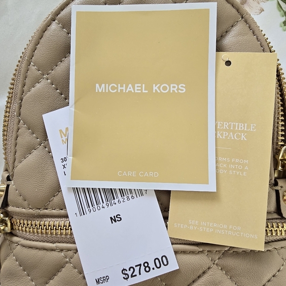Michael Kors Cream Quilted Backpack with Gold Accents - Picture 14 of 17